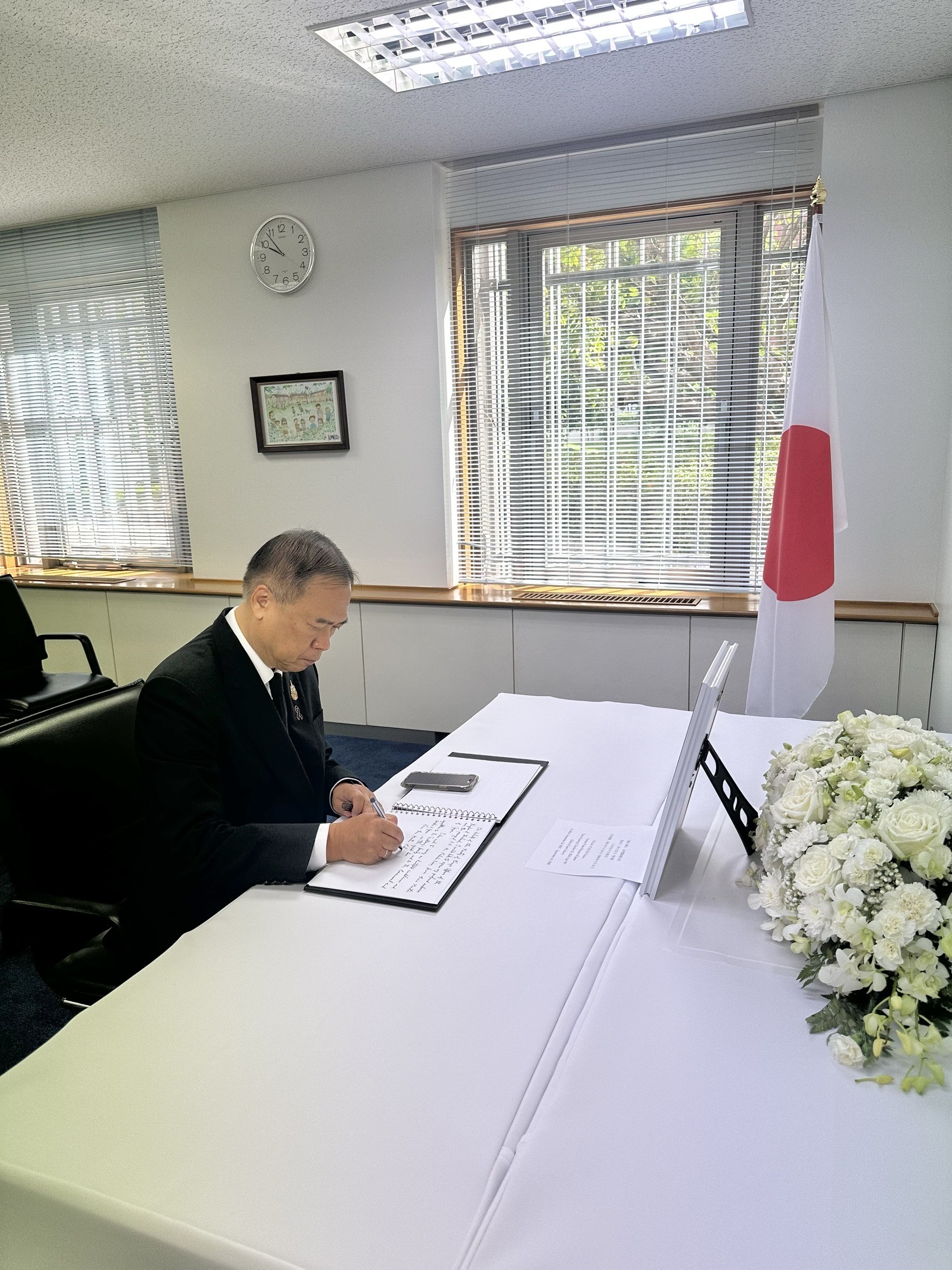 Thai Minister Signs Book of Condolences for Former Japanese PM Fukuda